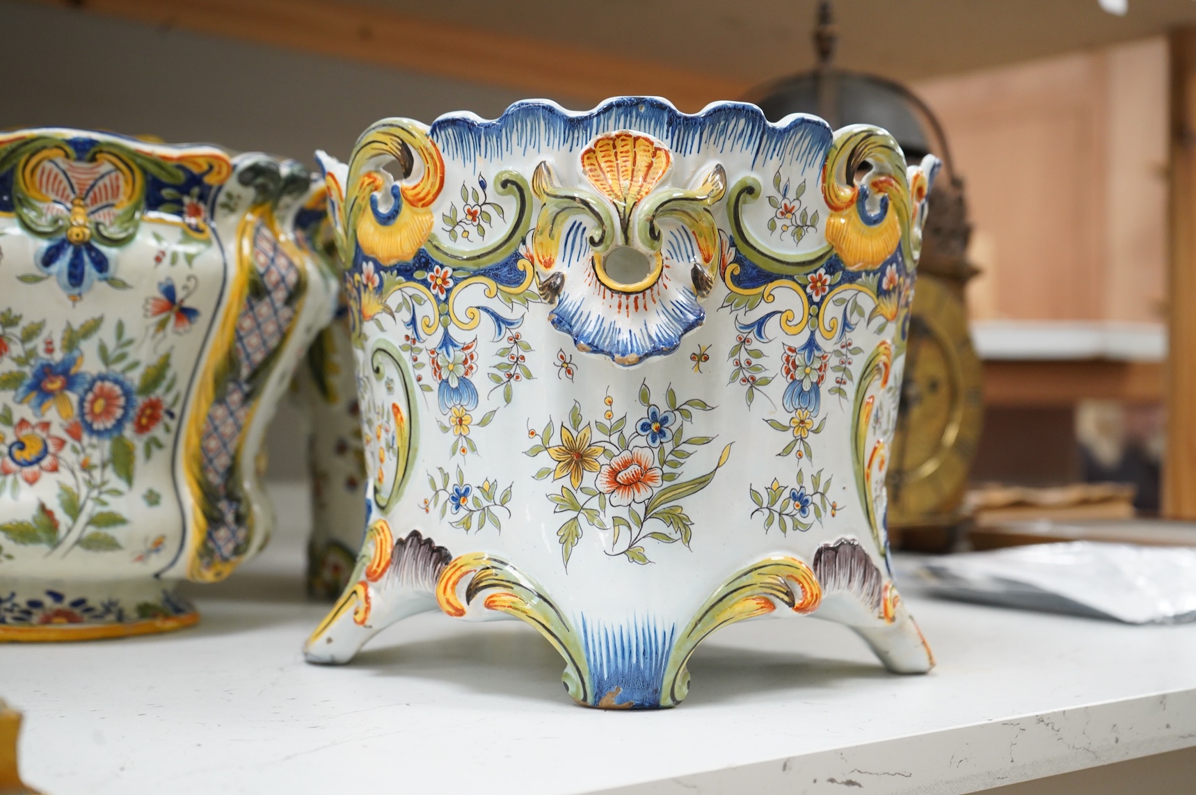 Four various late 19th century French faience planters and jardinières, largest 32cm in diameter